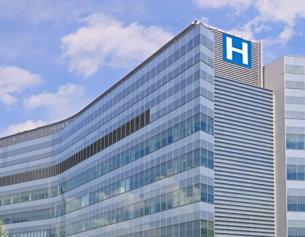 Exterior of a hospital building representing the move to more secure credential technology